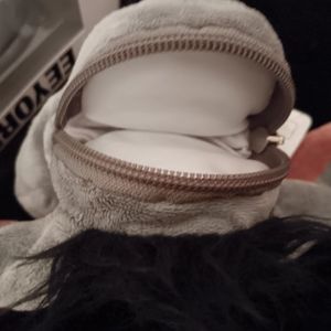 Disney funko pop eeyore 1170 with eeyore purse key chain included.